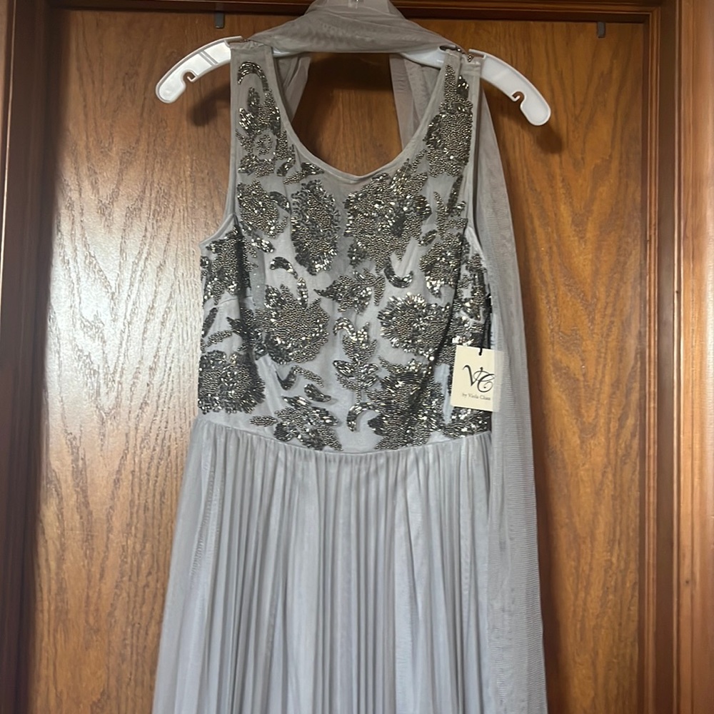Formal dress. Size 12.   Tank top Beaded bodice. Long pleated.  150$ +S/H